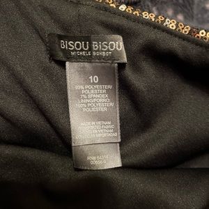 Cute going out dress. One sleeve with slit. Short above the knee